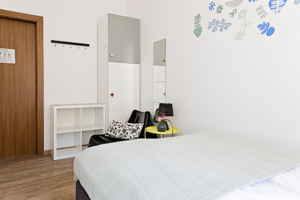 Posteľ alebo postele v izbe v ubytovaní Folk Hostel