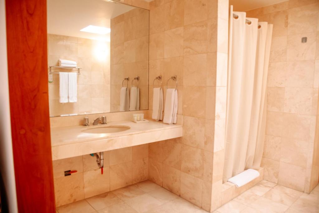 Ένα μπάνιο στο Hotel Carrera
