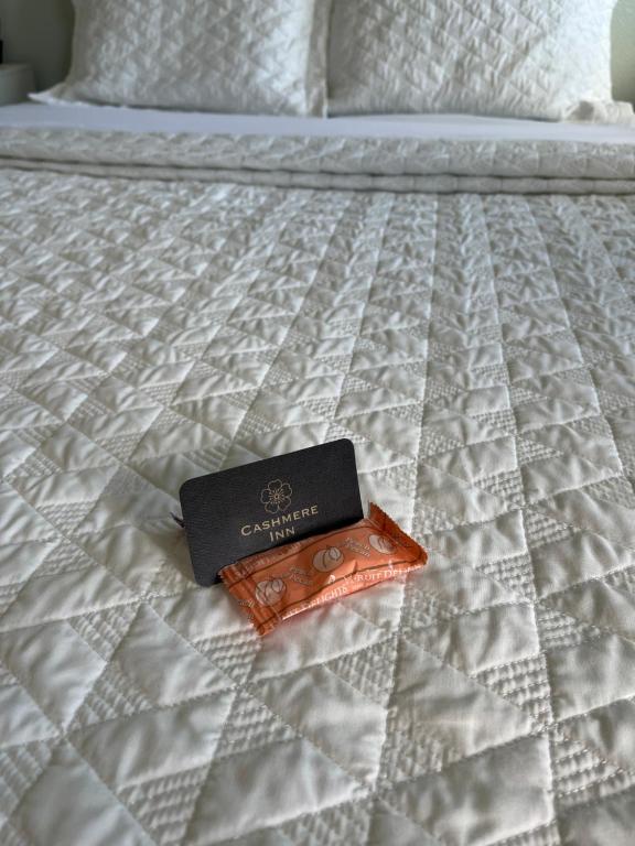 Postel nebo postele na pokoji v ubytování Cashmere Inn