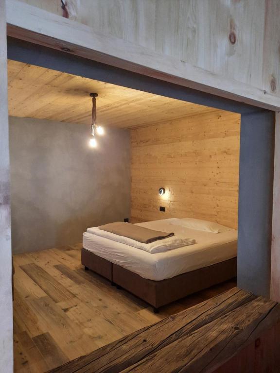 Postel nebo postele na pokoji v ubytování Hotel del Bosco