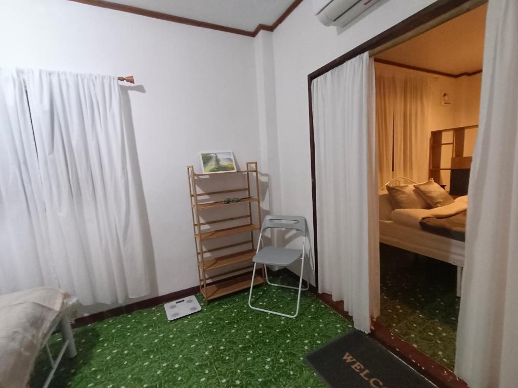 Postel nebo postele na pokoji v ubytování Tiki Bar-KanTiang Guesthouse