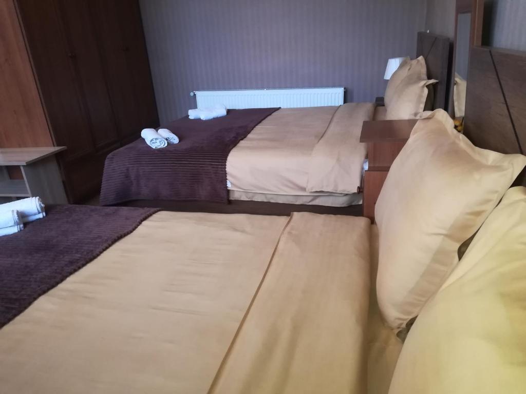 Postel nebo postele na pokoji v ubytování Golden Gate