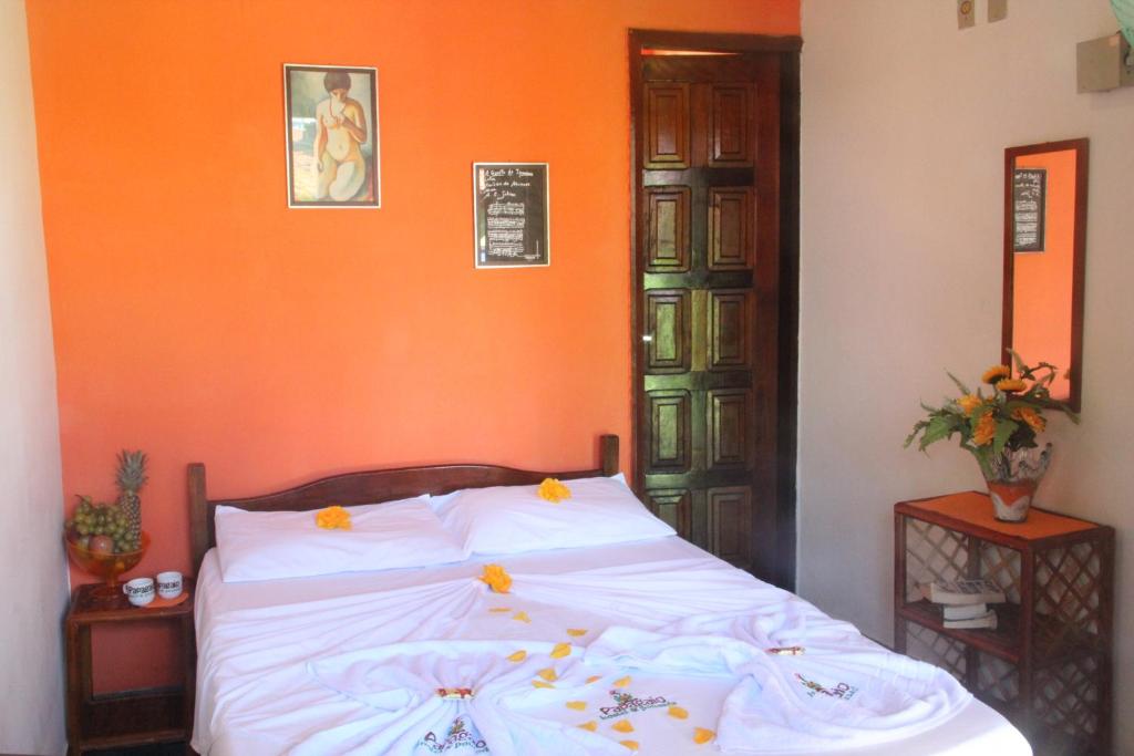 Voodi või voodid majutusasutuse Papagaio Hostel & Pousada toas