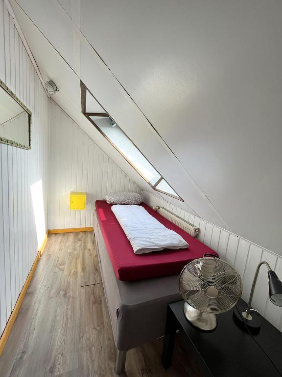 Postel nebo postele na pokoji v ubytování Homeplanet Hostel