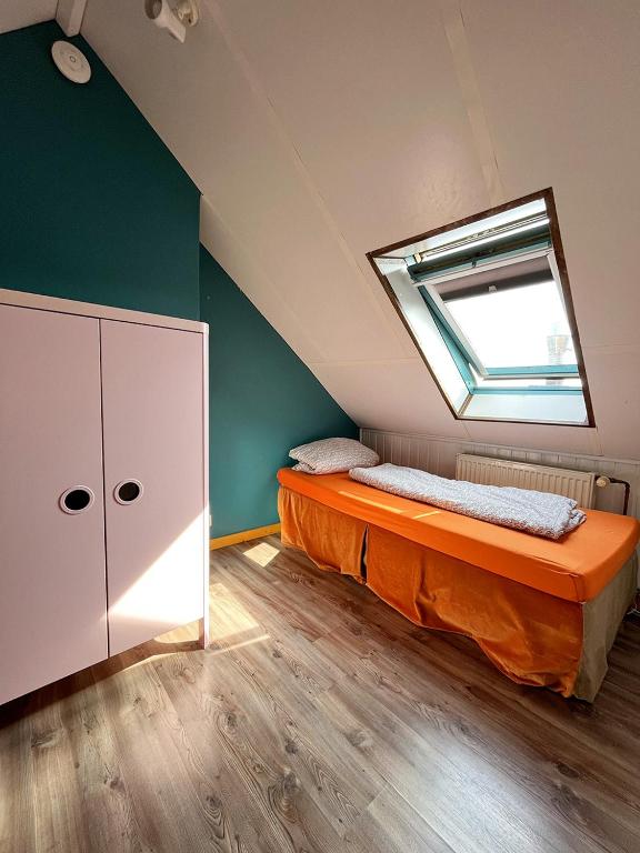 Postel nebo postele na pokoji v ubytování Homeplanet Hostel