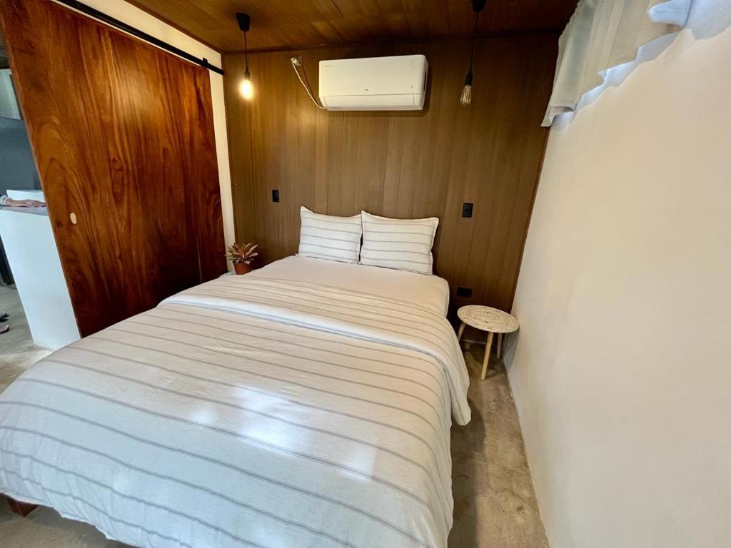 Postel nebo postele na pokoji v ubytování Sweet Jungle Beach