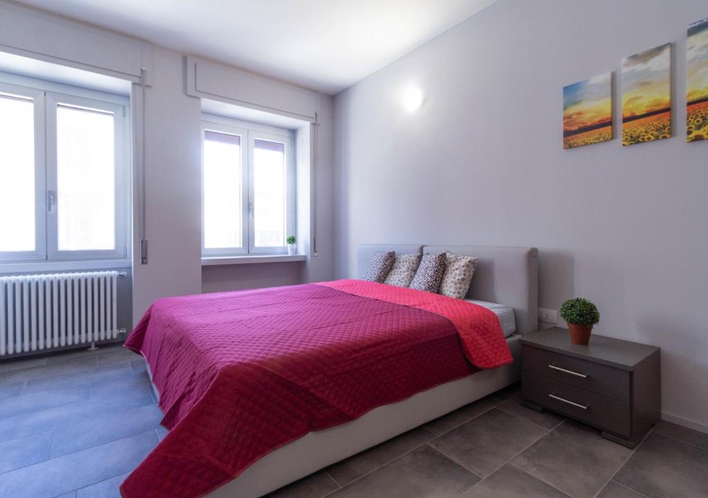 Postel nebo postele na pokoji v ubytování Girasole Apartment - Affitti Brevi Italia