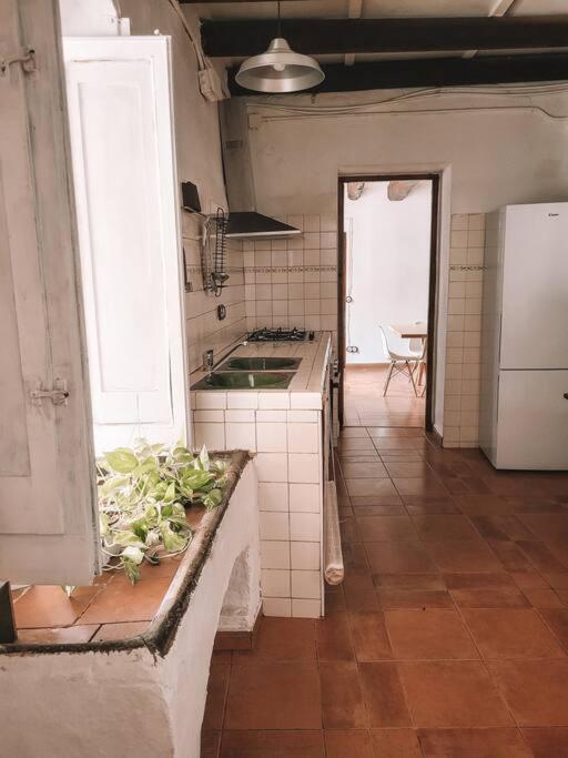 Kuchyň nebo kuchyňský kout v ubytování Casa Om