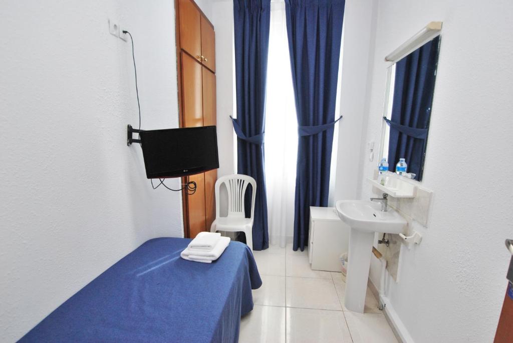 Kúpeľňa v ubytovaní Hotel Tres Leones