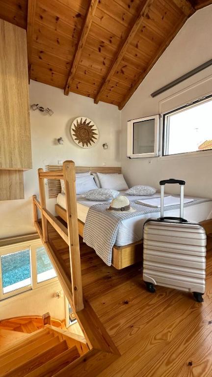 Postel nebo postele na pokoji v ubytování Del Sol Suites