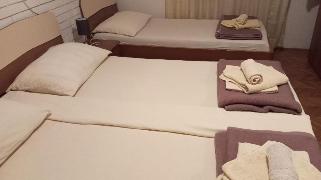 Postel nebo postele na pokoji v ubytování Jasna1