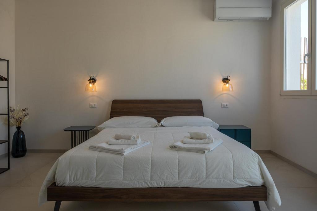 Voodi või voodid majutusasutuse Murieri Rooms toas