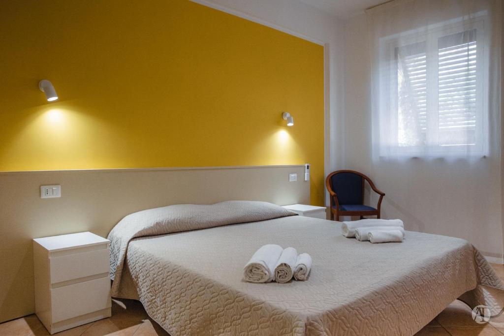 Posteľ alebo postele v izbe v ubytovaní Andrea Case Vacanze L'Ancora