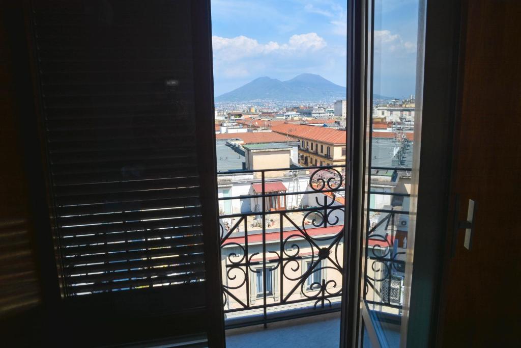 a view of a city from a window at FURTURE'Rooms in Naples