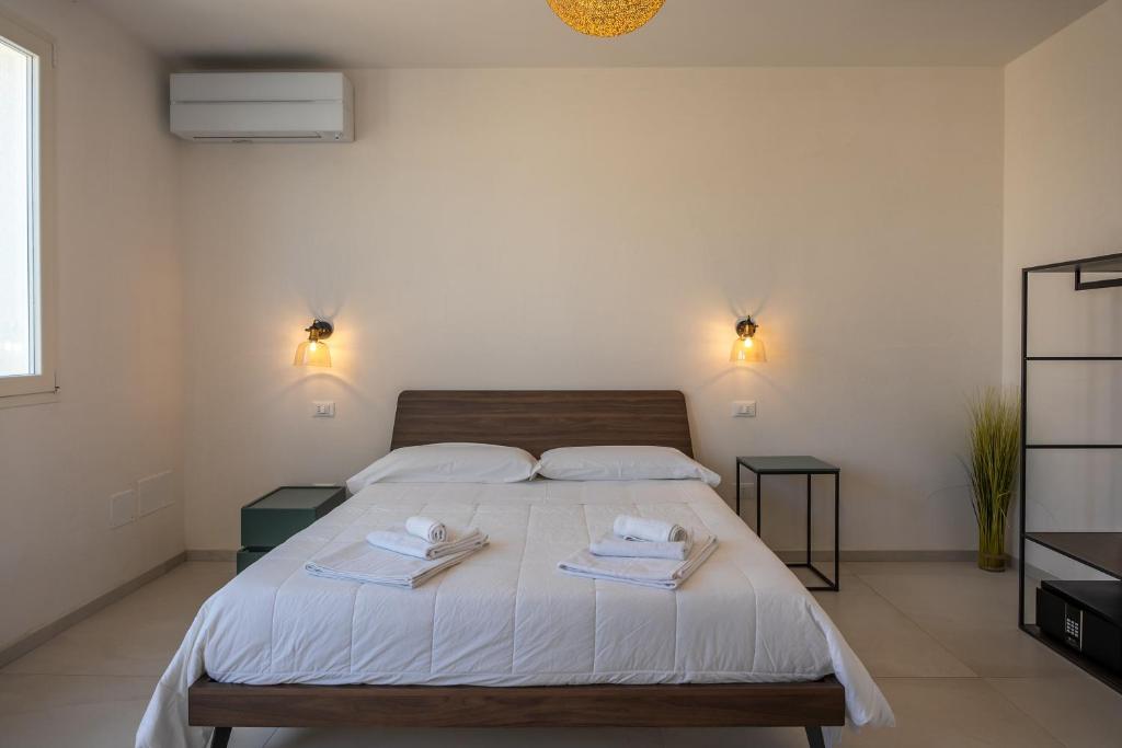 Voodi või voodid majutusasutuse Murieri Rooms toas