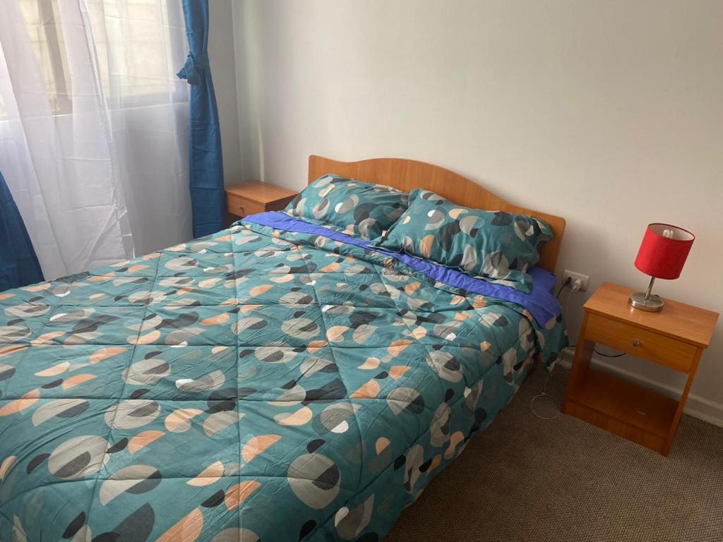 Ένα ή περισσότερα κρεβάτια σε δωμάτιο στο Departamento El Brillador