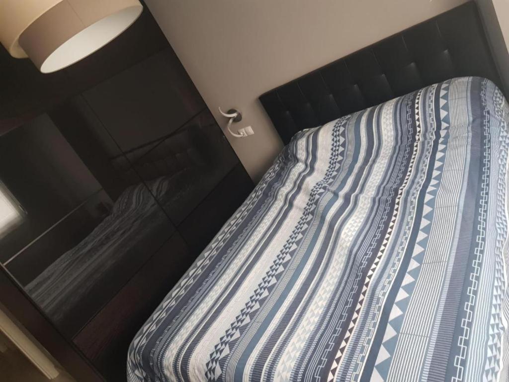 Katil atau katil-katil dalam bilik di Habitaciones en Ronda
