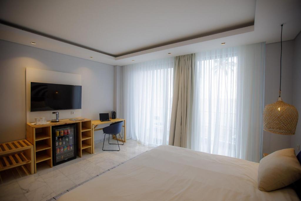 TV a/nebo společenská místnost v ubytování Cowork Lab Suites