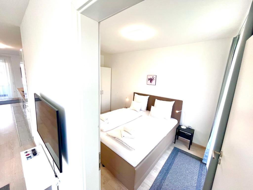 Posteľ alebo postele v izbe v ubytovaní BUDAPEST DOWNTOWN RESIDENCES LEO - AC, ELEVATOR, TERRACE