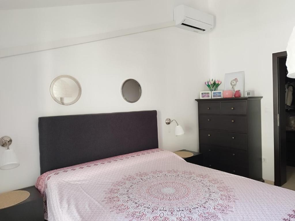 Posteľ alebo postele v izbe v ubytovaní Ferienwohnung am Sandstrand