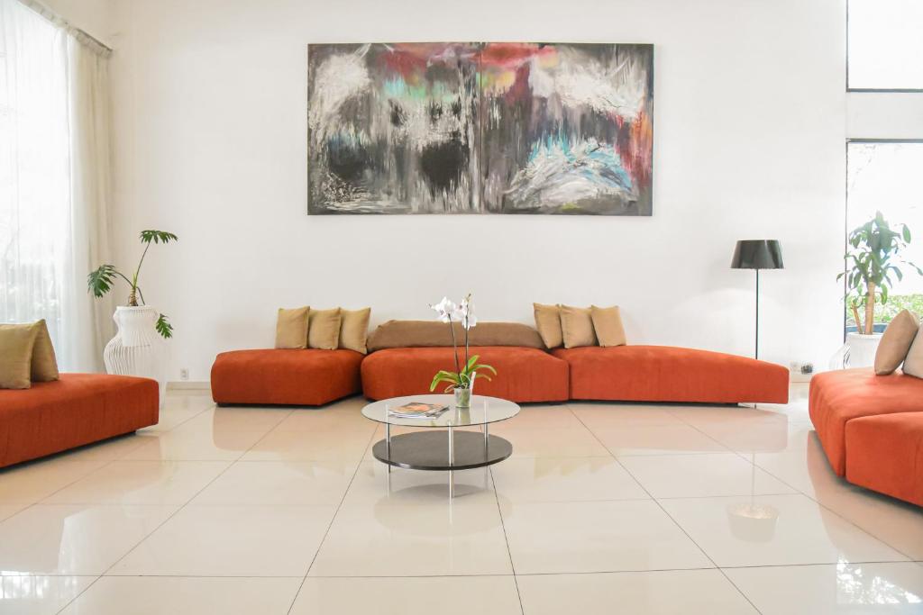 Posezení v ubytování Hotel Expo Plaza Business and Family Guadalajara