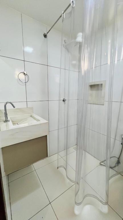 Um banheiro em Hotel Pousada Kairos Manaira
