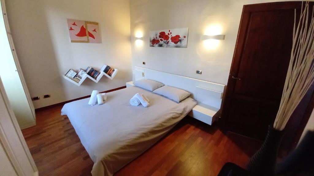 Postel nebo postele na pokoji v ubytování Borgo 134