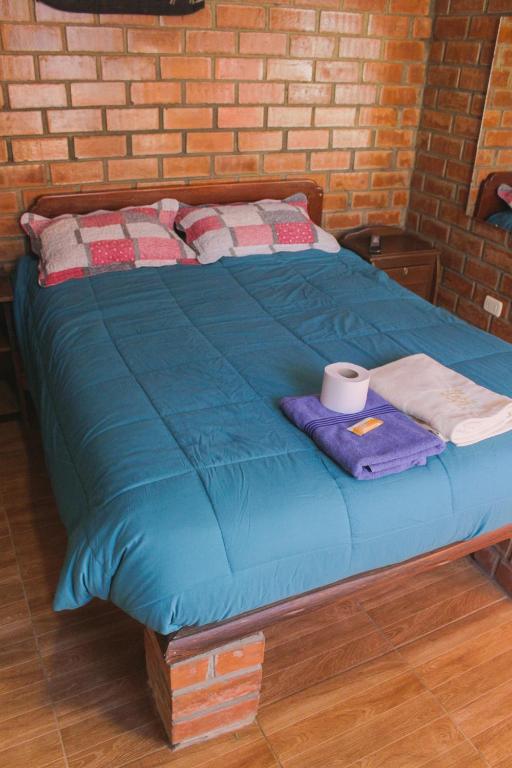 Postel nebo postele na pokoji v ubytování Casa Hospedaje"Los Capulies"