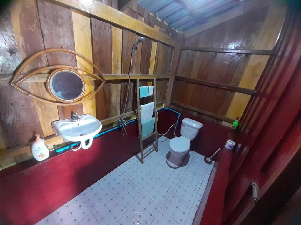 an overhead view of a bathroom with a sink and toilet at Blondies Koh Rong Villa in Koh Rong Island