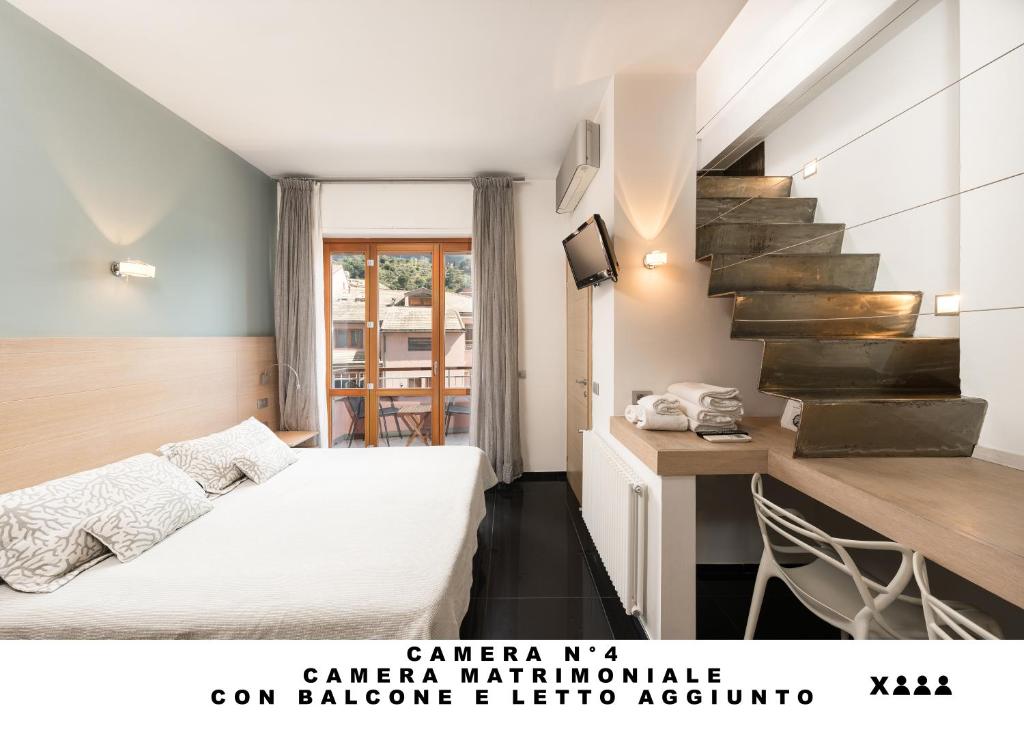 Postel nebo postele na pokoji v ubytování Affittacamere Lo Scoglio (Guesthouse)