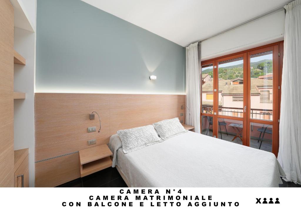 Postel nebo postele na pokoji v ubytování Affittacamere Lo Scoglio (Guesthouse)