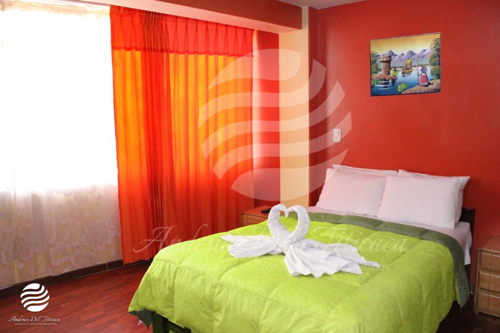 Postel nebo postele na pokoji v ubytování ANDENES DEL TITICACA
