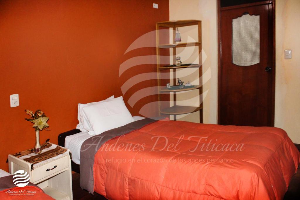 Postel nebo postele na pokoji v ubytování ANDENES DEL TITICACA