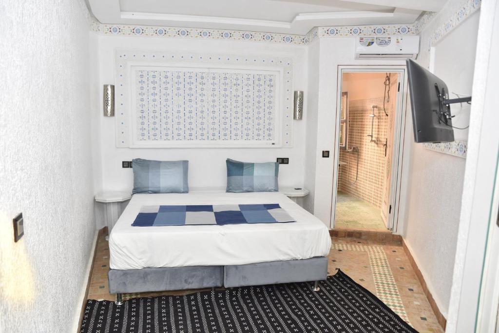 Posteľ alebo postele v izbe v ubytovaní Golf Stinia hôtel & Spa