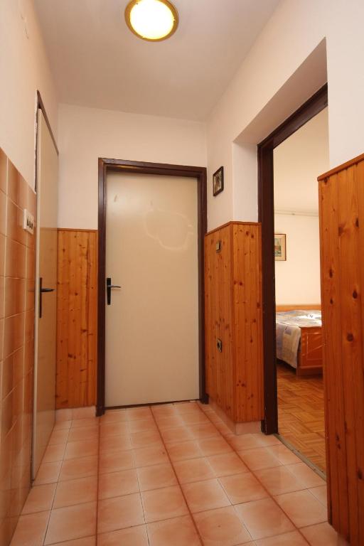 Postel nebo postele na pokoji v ubytování Apartments with a parking space Fazana - 7230
