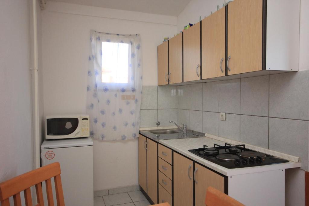 Kuchyň nebo kuchyňský kout v ubytování Apartments with a parking space Fazana - 7230