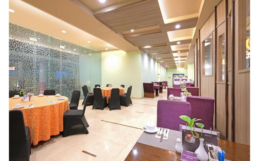Zona de estar de Quest Hotel Simpang Lima - Semarang by ASTON