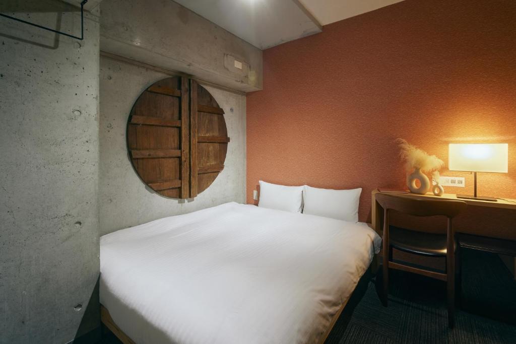 Postel nebo postele na pokoji v ubytování Common de - Hostel & Bar