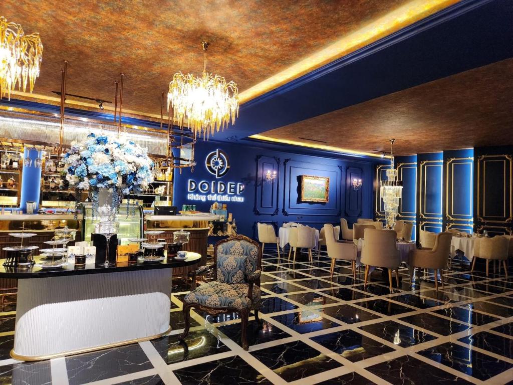 Khu vực ghế ngồi tại La Fleur Premium Central Apartment Hotel
