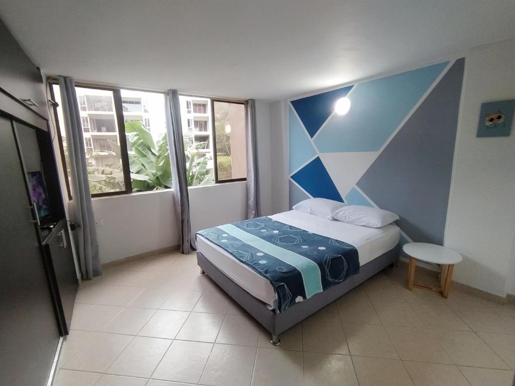Ein Bett oder Betten in einem Zimmer der Unterkunft Apartalofts Cali - Hermoso Loft Zona Oeste 25 m2