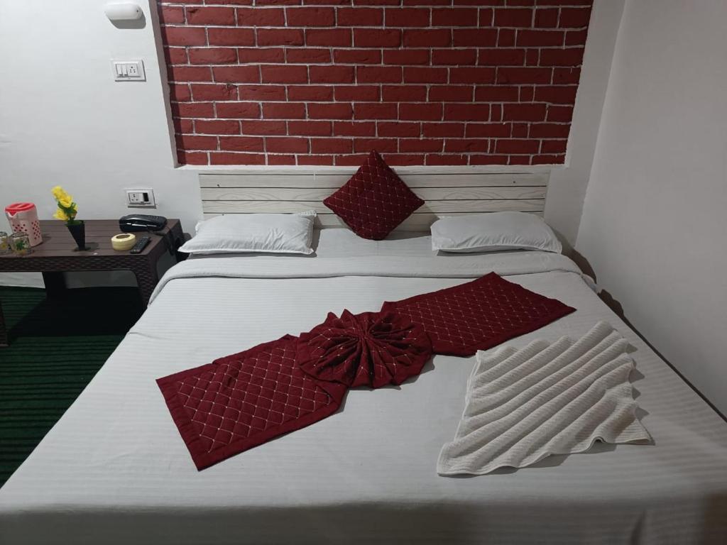 Postel nebo postele na pokoji v ubytování Shamus Javed Homestay