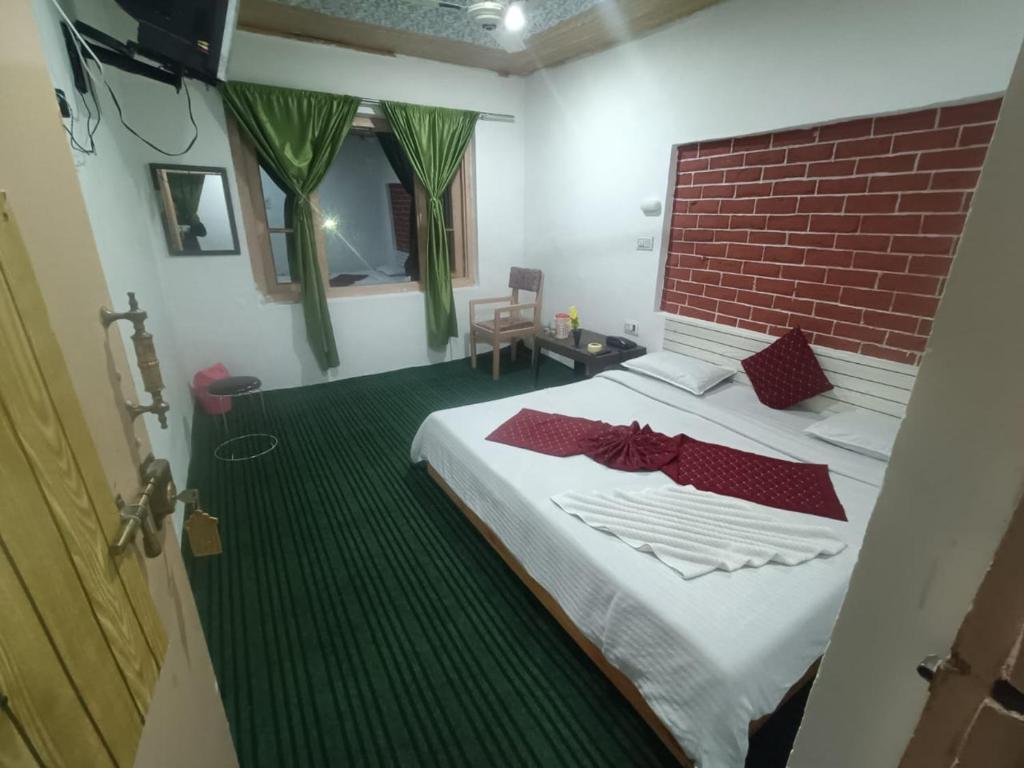Postel nebo postele na pokoji v ubytování Shamus Javed Homestay