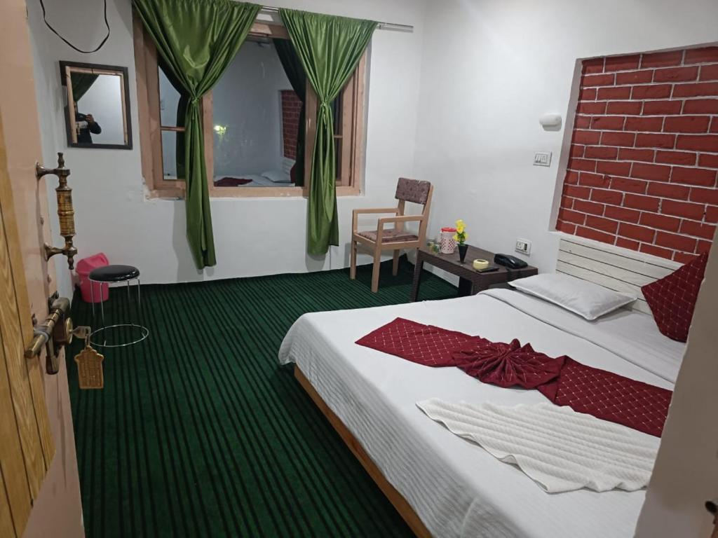 Postel nebo postele na pokoji v ubytování Shamus Javed Homestay