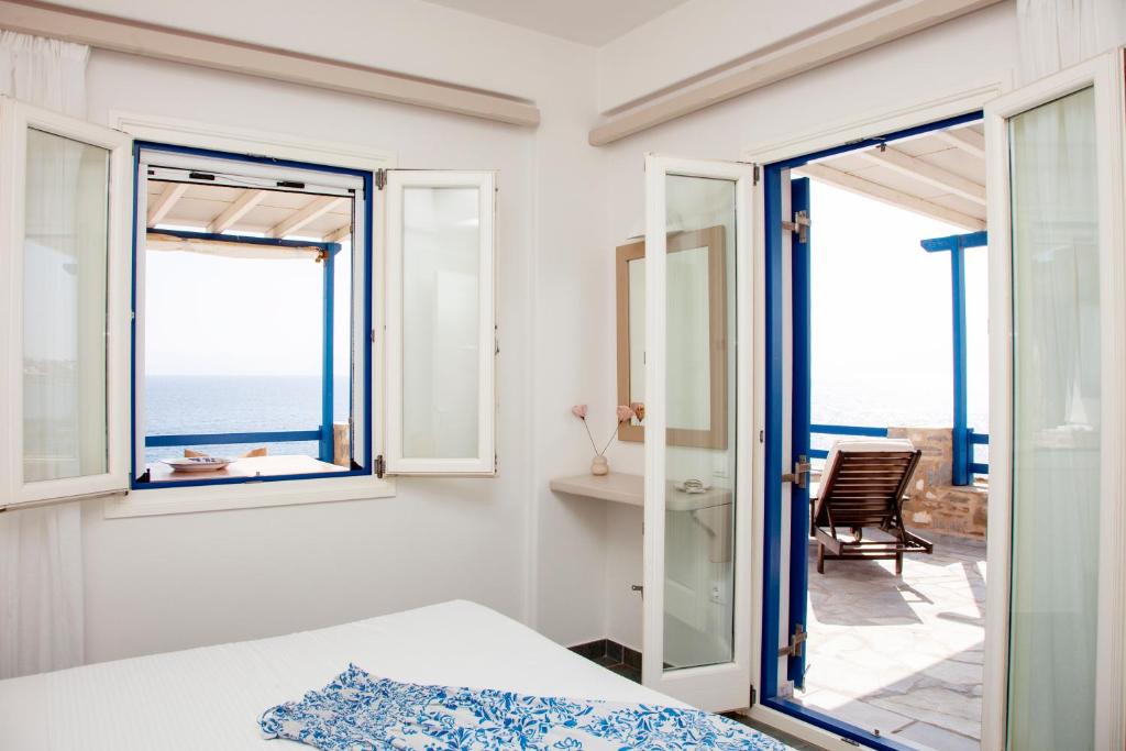 Postel nebo postele na pokoji v ubytování Aura Paros