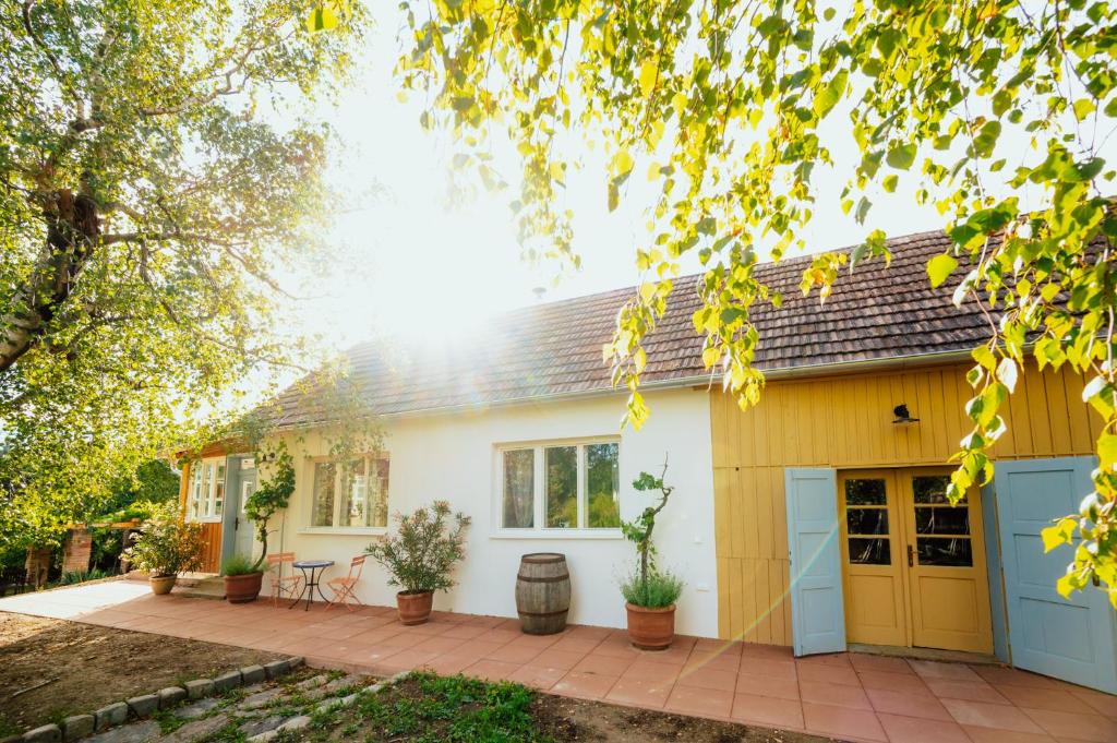a house with a patio in front of it at Country house Harmonia in Modra