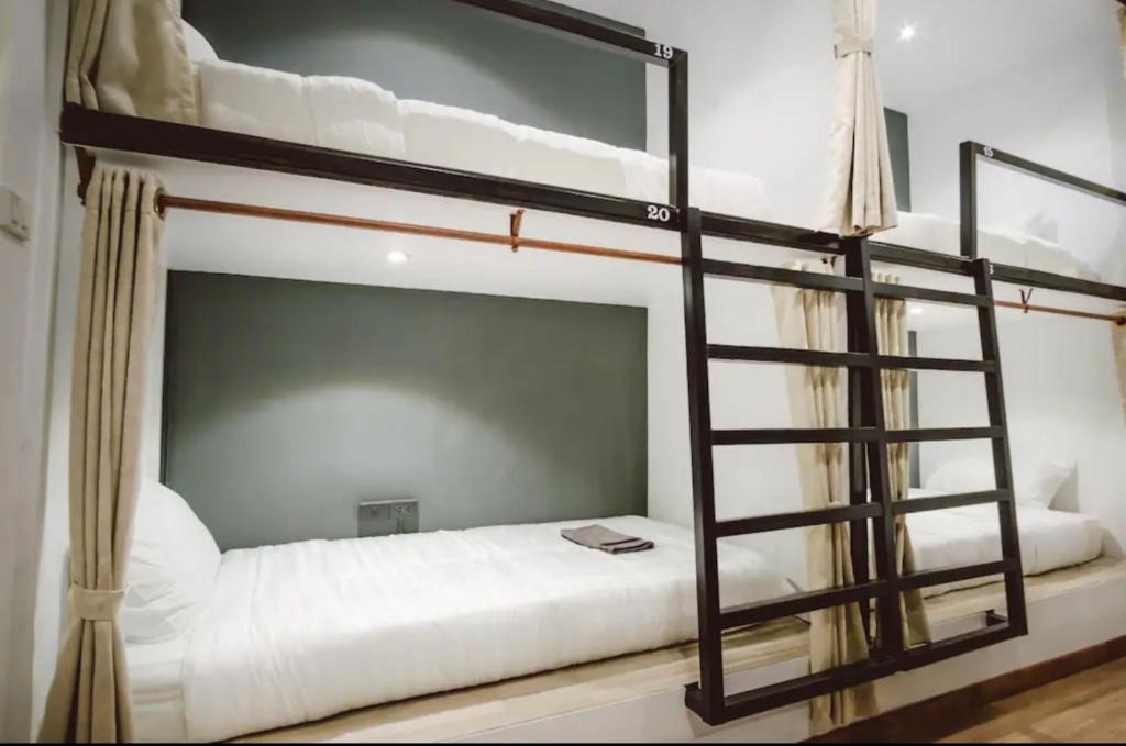 Postel nebo postele na pokoji v ubytování DANG HOSTEL