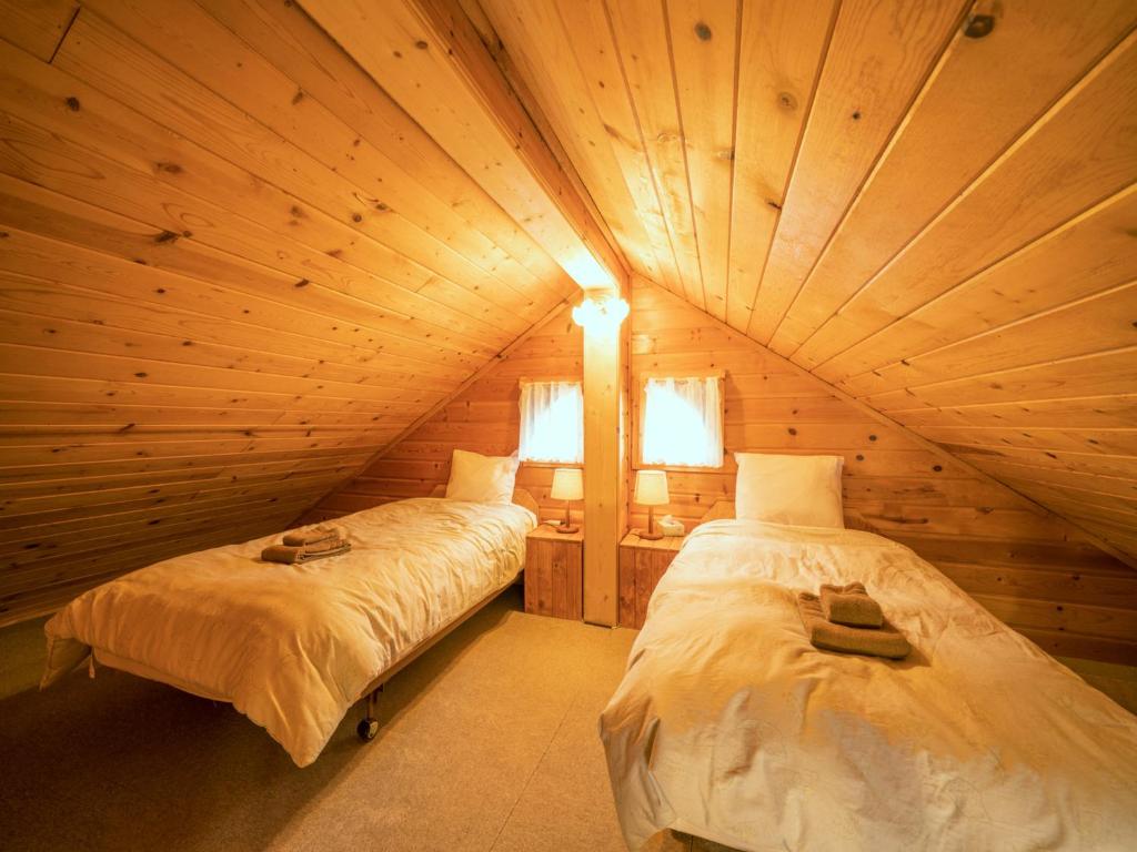 Postel nebo postele na pokoji v ubytování Madarao Vacances Village
