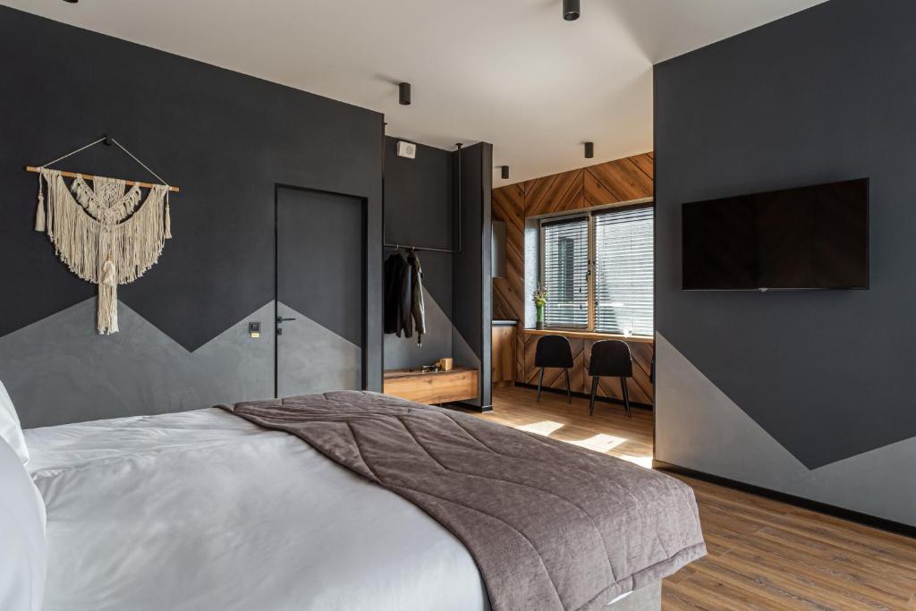 Postel nebo postele na pokoji v ubytování Didukh Eco Hotel&Spa