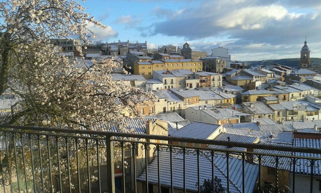 a view of a city with snow covered roofs at Vegas de la Alcarria in Horche