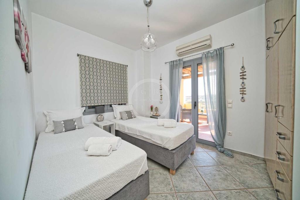 Postel nebo postele na pokoji v ubytování Villa Clementine